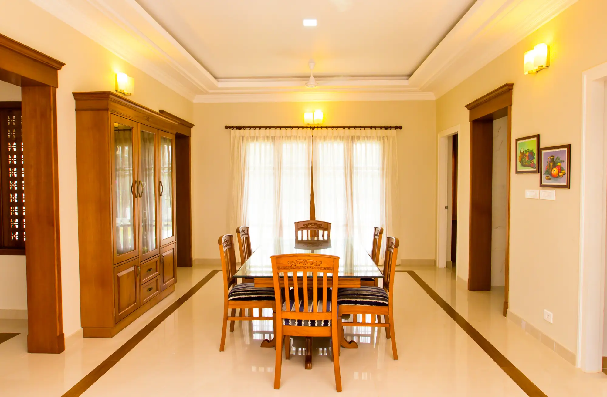 a well decorated dining room with good lighting